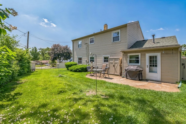 1313 Glen Hill Dr, Glendale Heights, IL 60139 - back of house with a patio area and a chimney