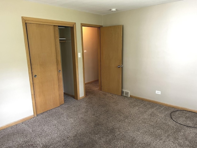 664 E 142nd St, Dolton, IL 60419 - unfurnished bedroom featuring carpet floors and a closet