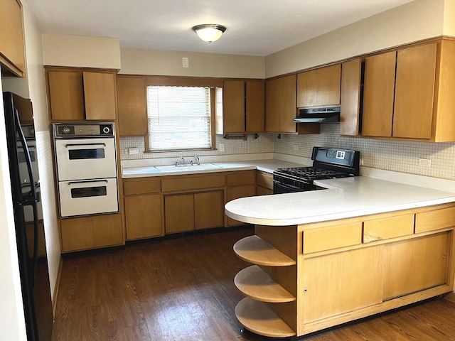 664 E 142nd St, Dolton, IL 60419 - kitchen featuring black appliances, under cabinet range hood, a peninsula, light countertops, and open shelves