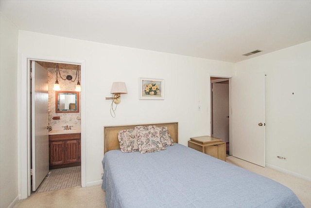 69 Grange Rd, Elk Grove Village, IL 60007 - bedroom featuring light carpet and connected bathroom