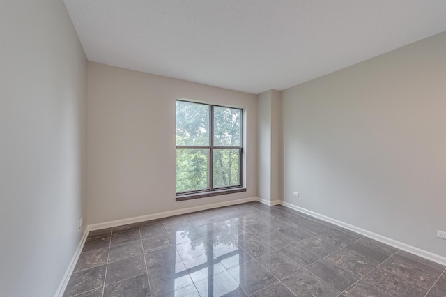 511 Aurora Ave Unit 410, Naperville, IL 60540 - empty room featuring baseboards