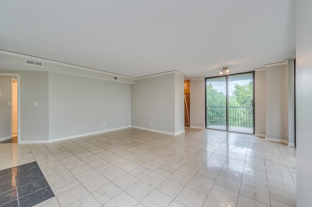 511 Aurora Ave Unit 410, Naperville, IL 60540 - spare room with expansive windows and light tile patterned floors
