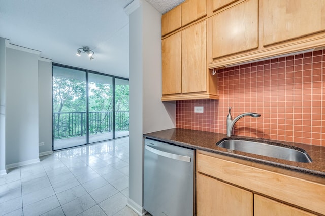511 Aurora Ave Unit 410, Naperville, IL 60540 - kitchen with dishwasher, expansive windows, light brown cabinetry, tasteful backsplash, and dark stone countertops