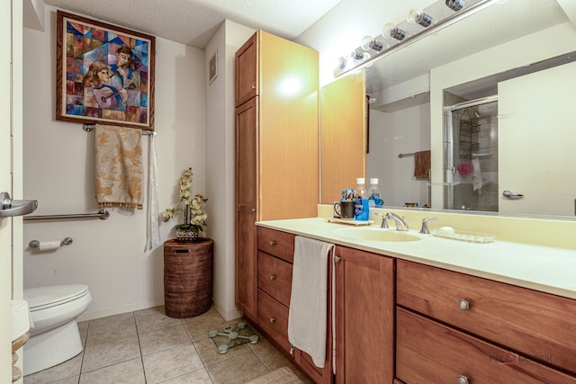 9655 Woods Dr Unit 1009, Skokie, IL 60077 - bathroom featuring vanity, a shower with door, tile patterned flooring, and a textured ceiling