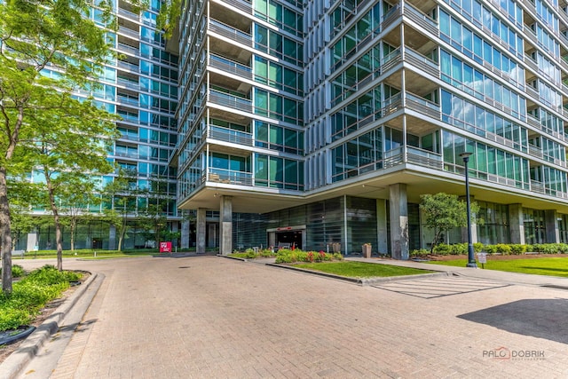 9655 Woods Dr Unit 1009, Skokie, IL 60077 - view of apartment building / complex