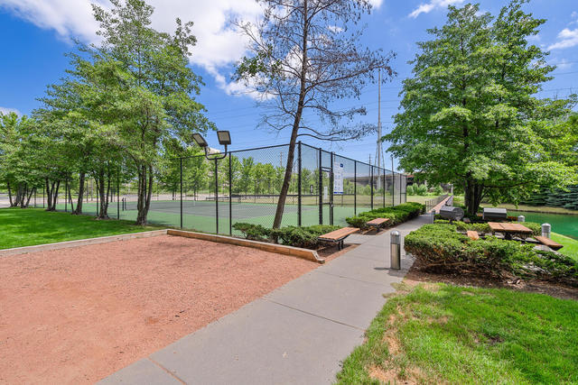 9655 Woods Dr Unit 1009, Skokie, IL 60077 - view of home's community featuring a tennis court