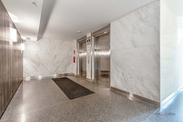 9655 Woods Dr Unit 1009, Skokie, IL 60077 - lobby featuring tile walls