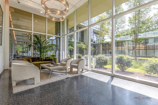 9655 Woods Dr Unit 1009, Skokie, IL 60077 - common area with a high ceiling and expansive windows