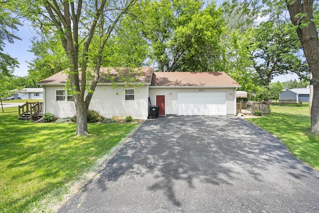 2602 Michael St, Wonder Lake, IL 60097 - view of front facade featuring an attached garage, driveway, and a shingled roof