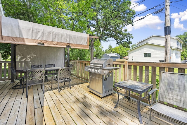 2602 Michael St, Wonder Lake, IL 60097 - wooden deck with grilling area and outdoor dining space