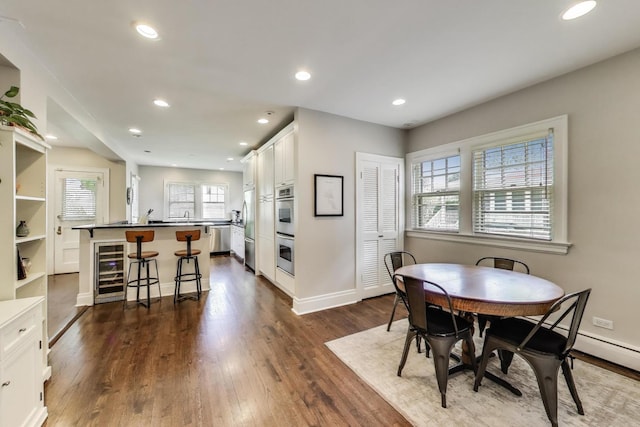 934 Jackson Ave, River Forest, IL 60305 - dining area featuring dark wood-style floors, wine cooler, and recessed lighting