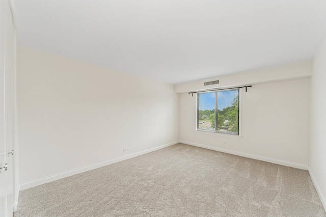 1605 E Central Rd Unit 411B, Arlington Heights, IL 60005 - unfurnished room with light colored carpet and baseboards