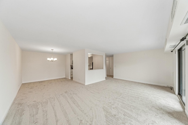 1605 E Central Rd Unit 411B, Arlington Heights, IL 60005 - unfurnished living room with a chandelier and light carpet