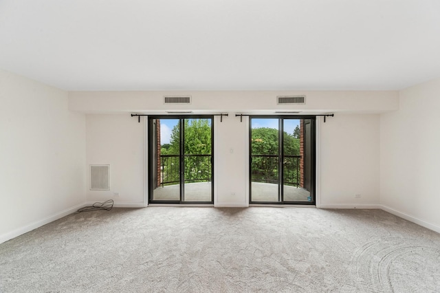 1605 E Central Rd Unit 411B, Arlington Heights, IL 60005 - spare room featuring carpet flooring