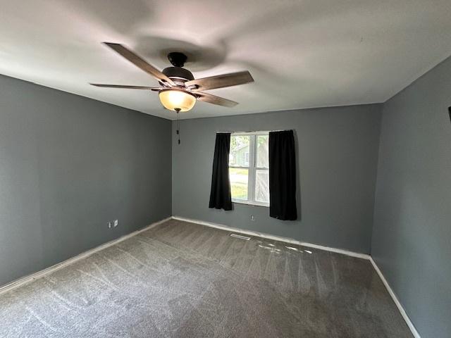 420 Wabash St, Wilmington, IL 60481 - unfurnished room with carpet floors and ceiling fan