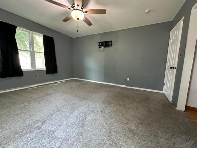 420 Wabash St, Wilmington, IL 60481 - carpeted empty room featuring a ceiling fan and baseboards