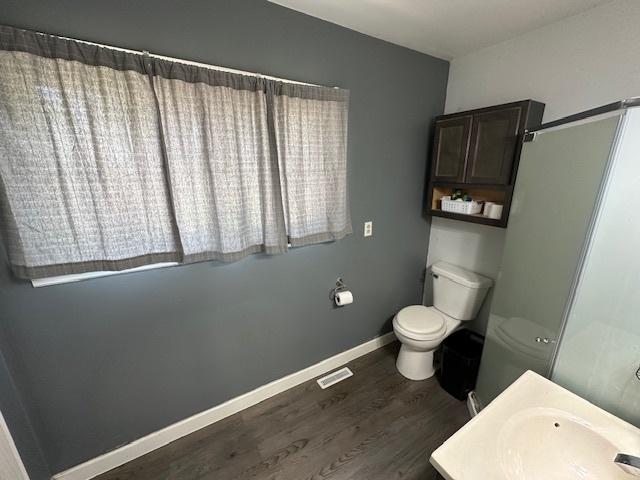 420 Wabash St, Wilmington, IL 60481 - full bath featuring wood finished floors and vanity