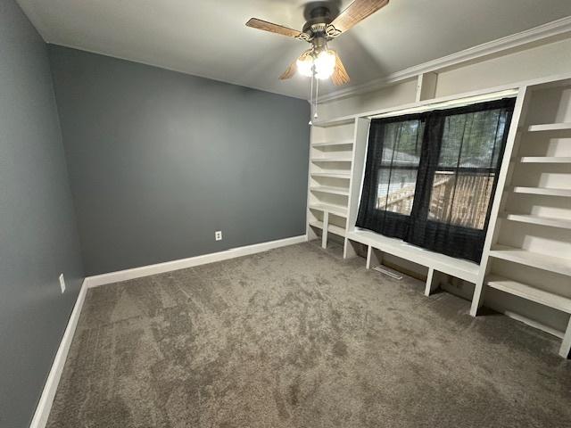 420 Wabash St, Wilmington, IL 60481 - spare room featuring carpet flooring and ceiling fan