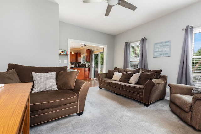 509 Magnolia Dr, North Aurora, IL 60542 - living area with ceiling fan and light carpet