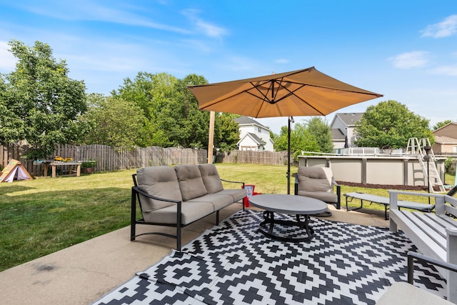 509 Magnolia Dr, North Aurora, IL 60542 - fenced backyard featuring an outdoor living space and a patio area