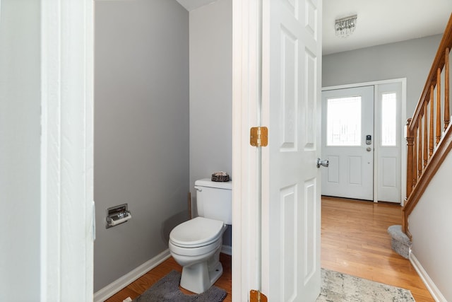 509 Magnolia Dr, North Aurora, IL 60542 - bathroom with toilet and wood finished floors