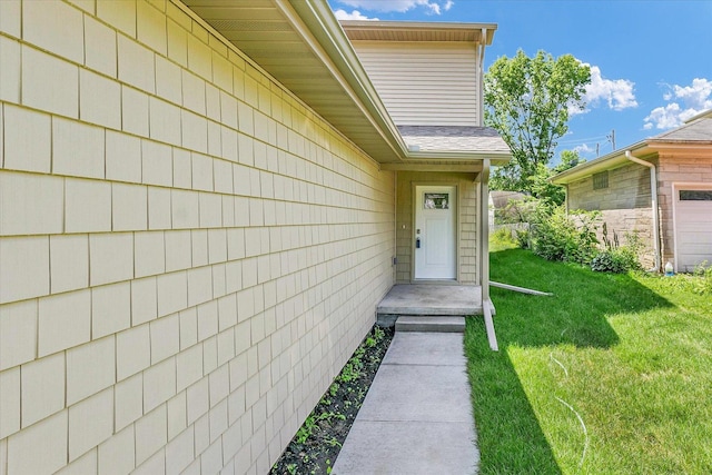 5 Montclair Rd Unit A, Urbana, IL 61801 - view of exterior entry with a yard