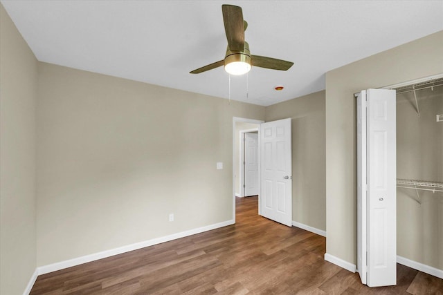 5 Montclair Rd Unit A, Urbana, IL 61801 - unfurnished bedroom with wood finished floors, a closet, and ceiling fan