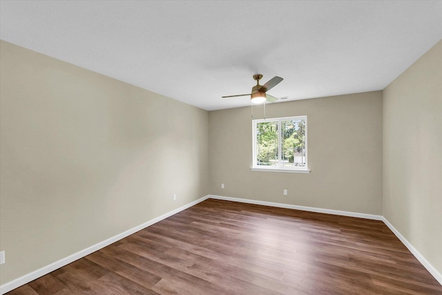 5 Montclair Rd Unit A, Urbana, IL 61801 - empty room featuring dark wood finished floors and ceiling fan