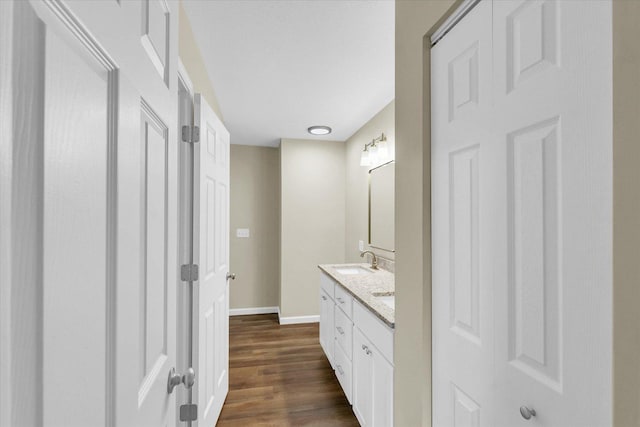 5 Montclair Rd Unit A, Urbana, IL 61801 - bathroom featuring double vanity and wood finished floors