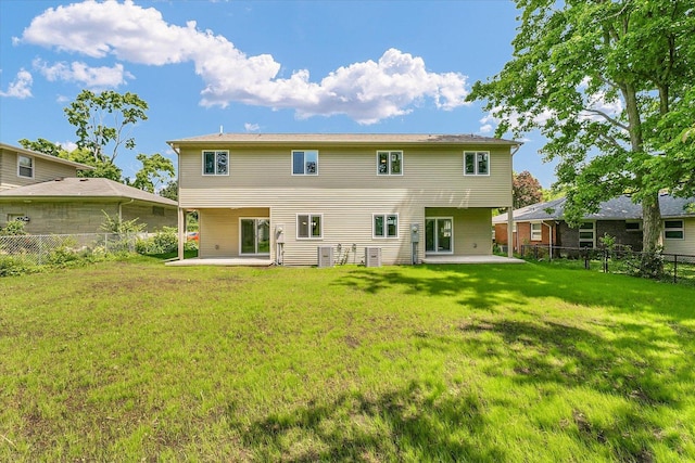 5 Montclair Rd Unit A, Urbana, IL 61801 - back of property with a patio and a fenced backyard