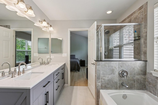 5608 Cambridge Way, Hanover Park, IL 60133 - ensuite bathroom with a garden tub, double vanity, a stall shower, and tile patterned floors