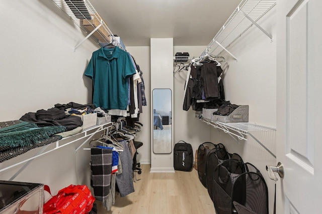 5608 Cambridge Way, Hanover Park, IL 60133 - walk in closet with wood finished floors