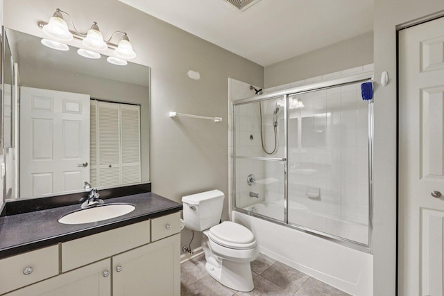 5608 Cambridge Way, Hanover Park, IL 60133 - bathroom featuring vanity, bath / shower combo with glass door, and tile patterned floors