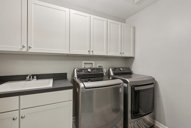 5608 Cambridge Way, Hanover Park, IL 60133 - laundry room featuring washer and dryer and cabinet space