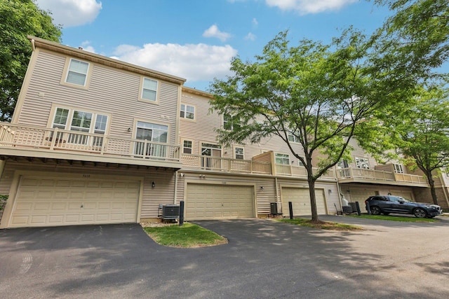 5608 Cambridge Way, Hanover Park, IL 60133 - view of property featuring an attached garage and driveway