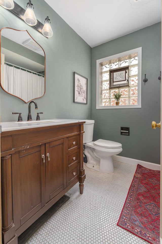5660 N Rogers Ave, Chicago, IL 60646 - bathroom featuring toilet and vanity