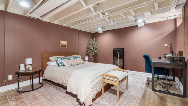 5660 N Rogers Ave, Chicago, IL 60646 - bedroom featuring light wood-style flooring and a desk