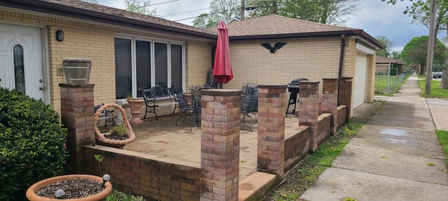 14300 S Palmer Ave, Posen, IL 60469 - view of home's exterior with brick siding, a patio, and roof with shingles