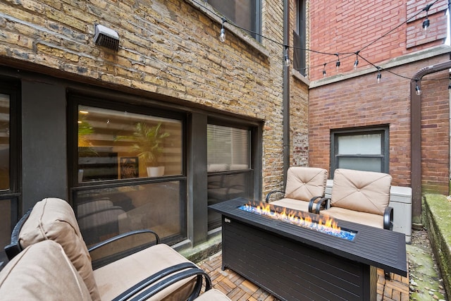 2150 W N Ave Unit 4, Chicago, IL 60647 - view of patio / terrace with a fire pit