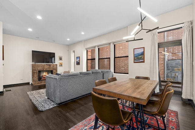 2150 W N Ave Unit 4, Chicago, IL 60647 - dining room featuring dark wood-type flooring, a fireplace, and recessed lighting