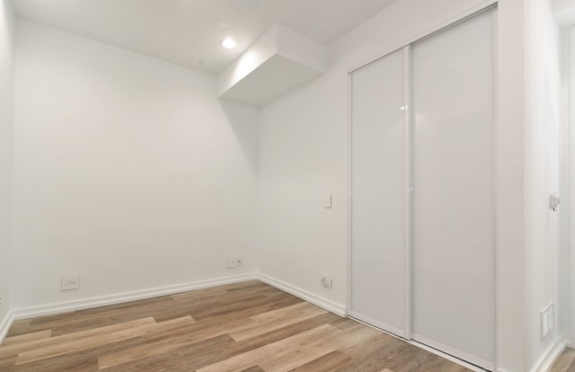 1420 W Fulton St, Chicago, IL 60607 - below grade area with light wood-style flooring and recessed lighting