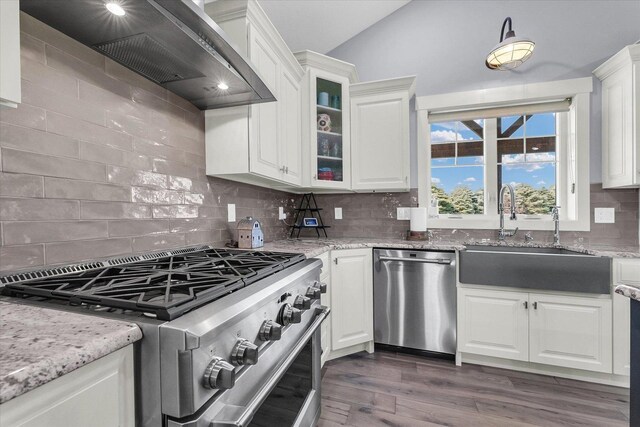 619 County Road 2550 N, Dewey, IL 61840 - kitchen featuring stainless steel appliances, wall chimney exhaust hood, and white cabinets