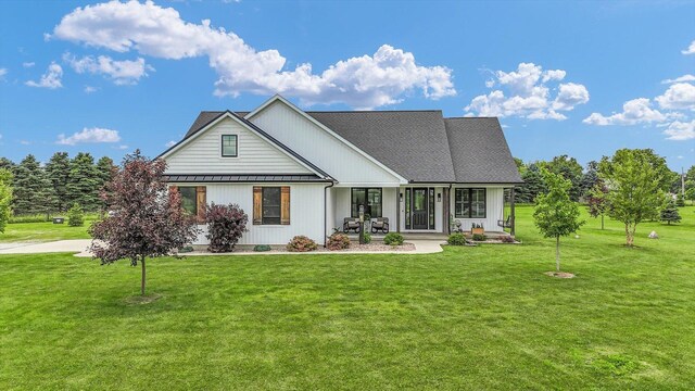619 County Road 2550 N, Dewey, IL 61840 - modern farmhouse with a front lawn and a porch