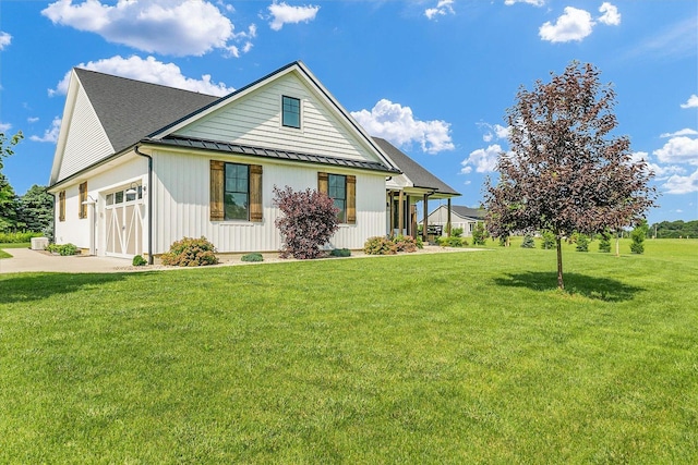 619 County Road 2550 N, Dewey, IL 61840 - modern farmhouse style home with a standing seam roof, a front lawn, and a metal roof