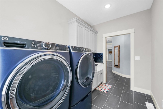 619 County Road 2550 N, Dewey, IL 61840 - laundry area featuring washing machine and dryer, cabinet space, and dark tile patterned flooring