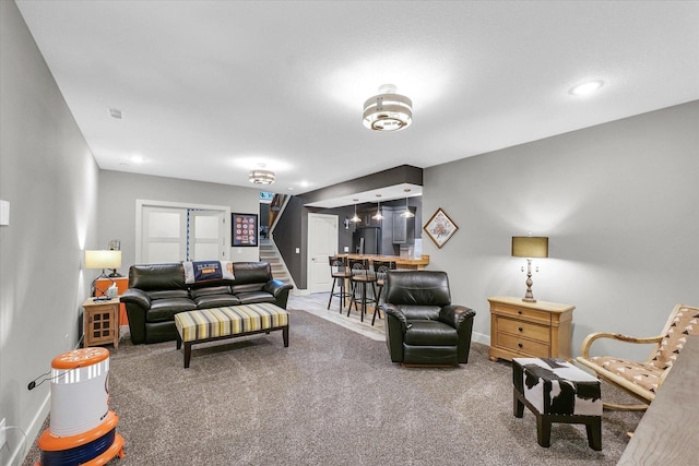 619 County Road 2550 N, Dewey, IL 61840 - carpeted living area with bar, stairs, and recessed lighting