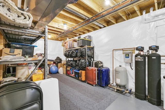 619 County Road 2550 N, Dewey, IL 61840 - unfinished basement with a water pressure tank and a water softener