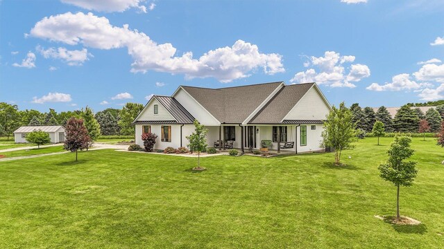 619 County Road 2550 N, Dewey, IL 61840 - view of front of home featuring a front lawn and a patio area