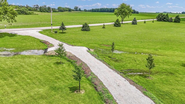 619 County Road 2550 N, Dewey, IL 61840 - view of home's community with a lawn, gravel driveway, and a view of countryside