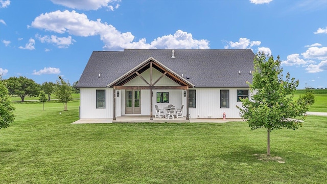 619 County Road 2550 N, Dewey, IL 61840 - rear view of property with a patio and a lawn